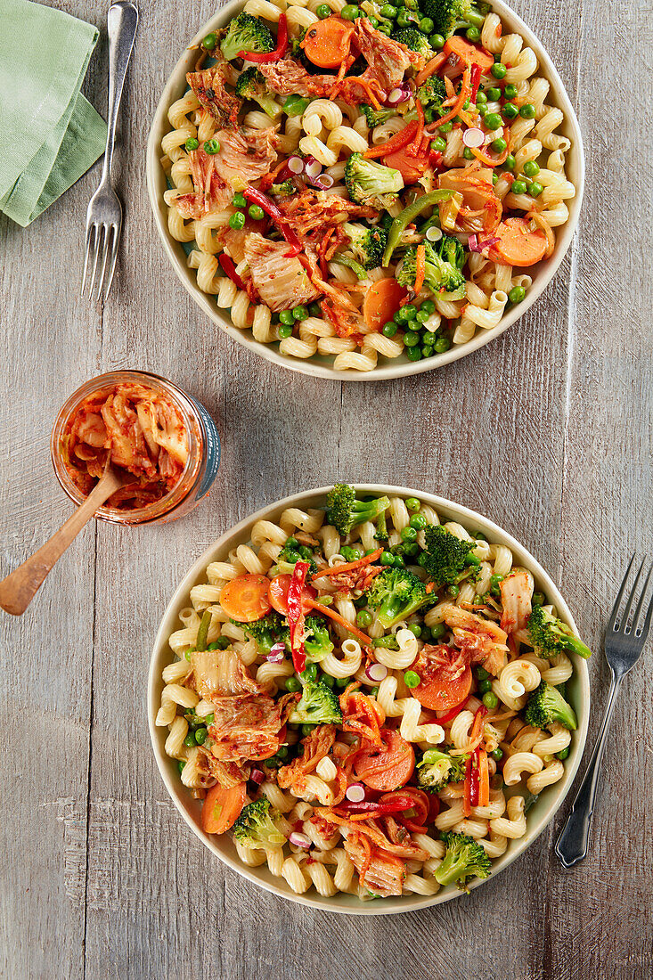 Pasta with garden vegetables and kimchi