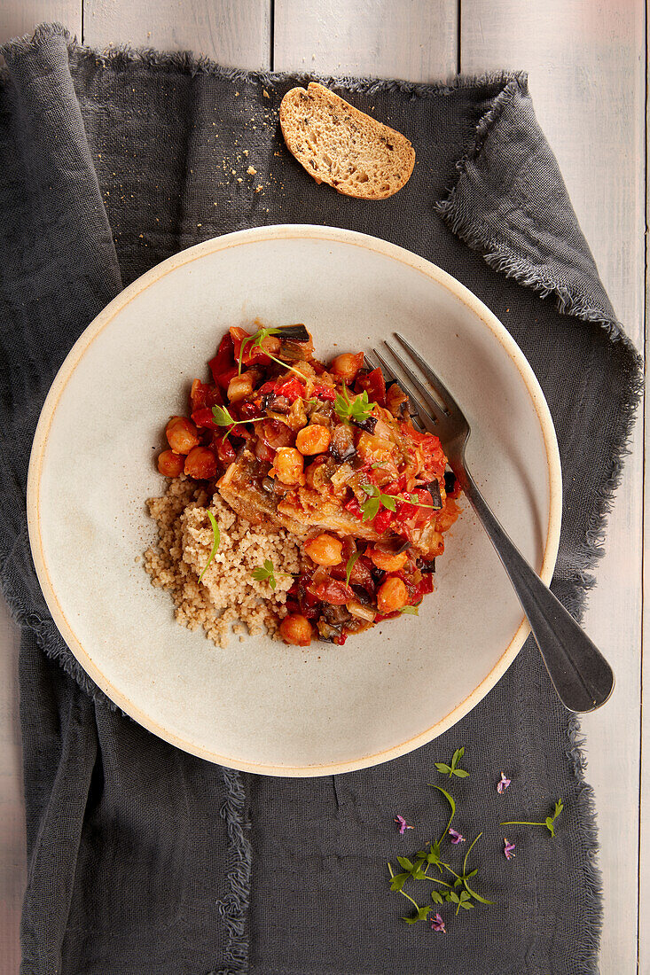 Cod samfaina with chickpeas on couscous