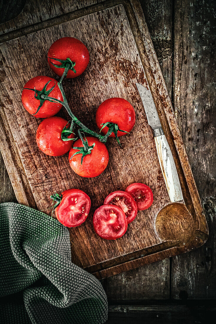 Vine tomatoes on a wooden board