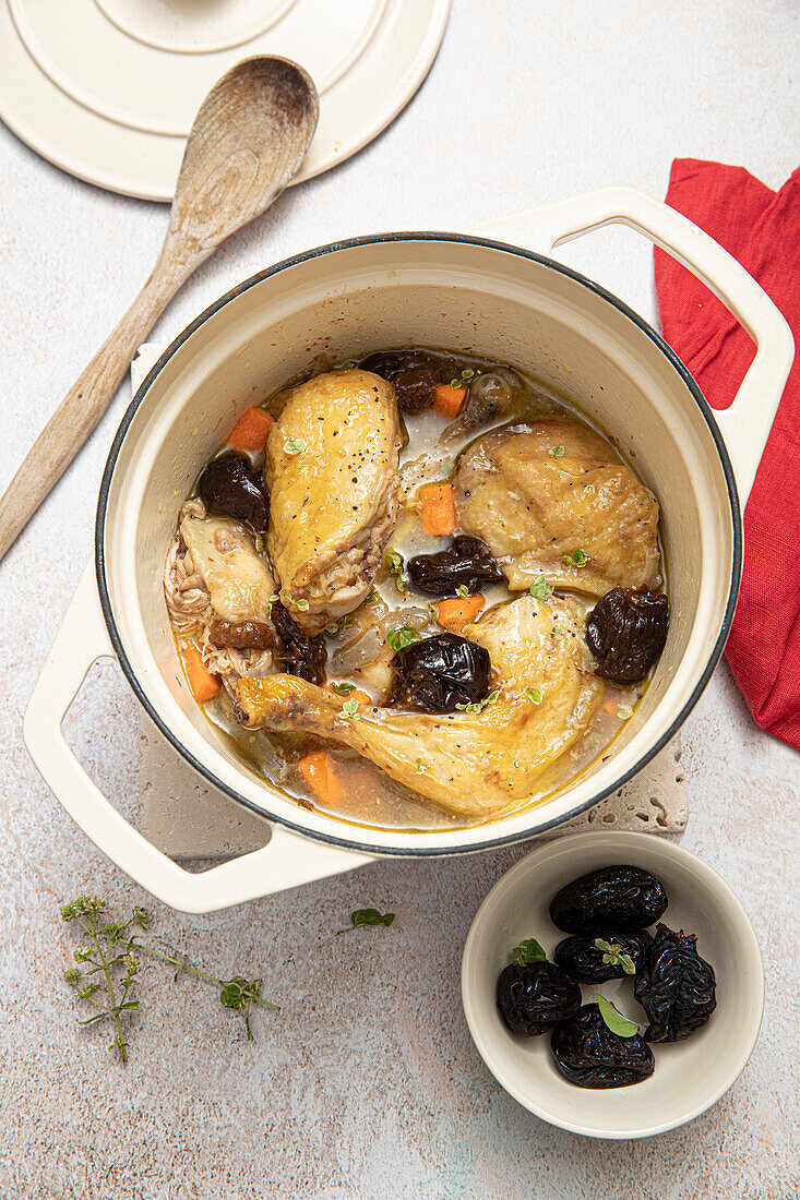 Chicken in sweet wine with prunes, carrots and oregano (France)
