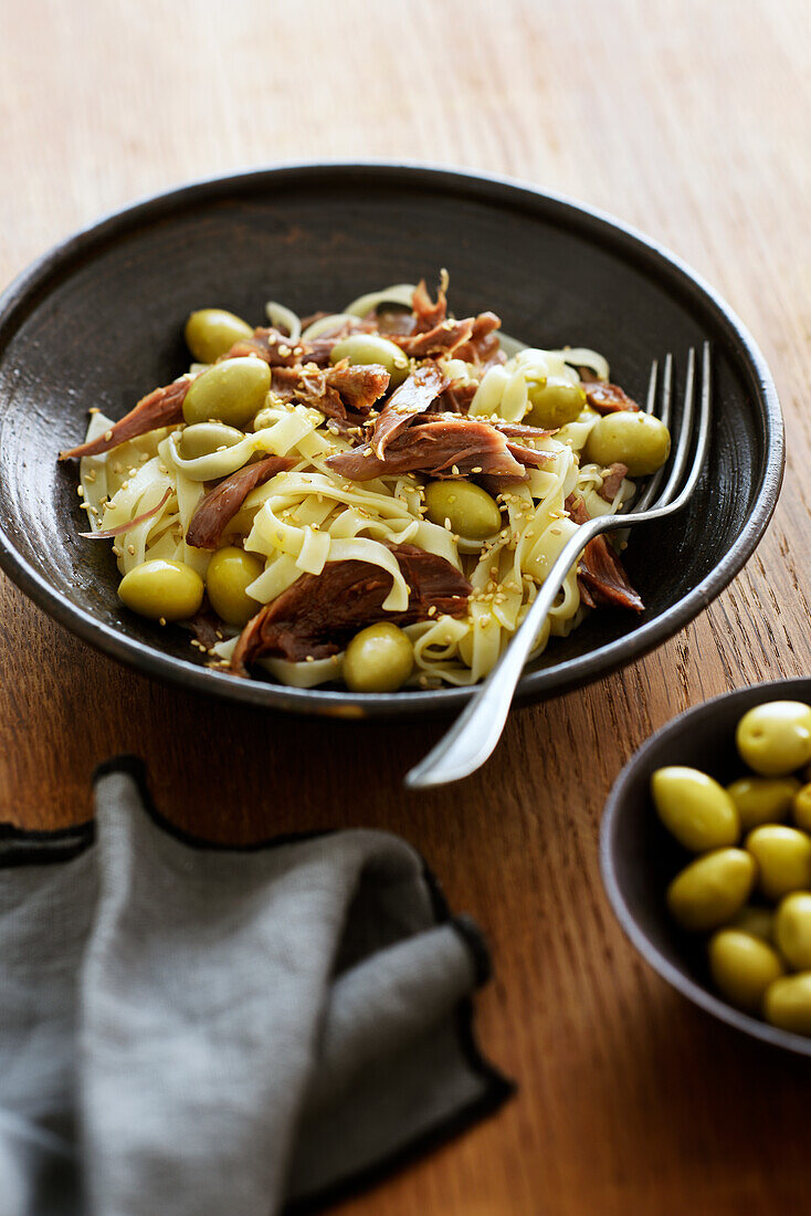 Tagliatelle with confit duck and olives