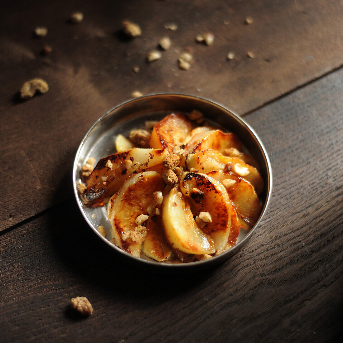 Roasted apples and pears with crumbles and macadamia nuts