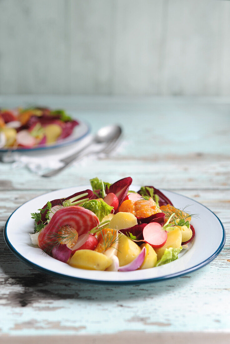 Potato salad with haddock and vegetables