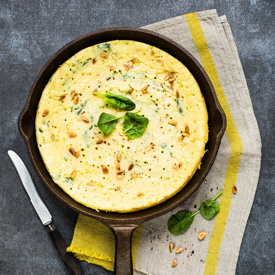 Spicy Spinach Frittata baked in a cast iron pan