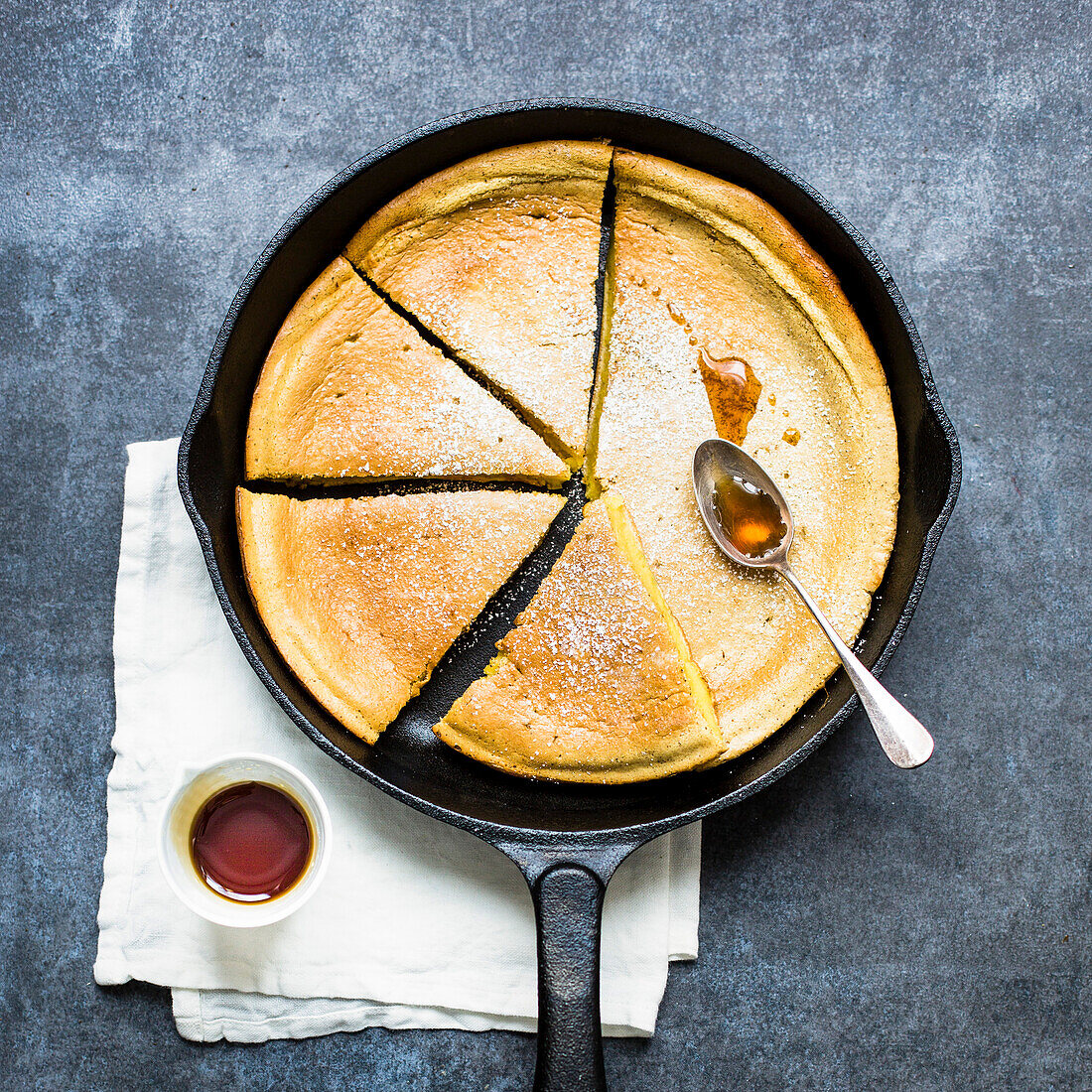 Baked pancake in a cast iron pan