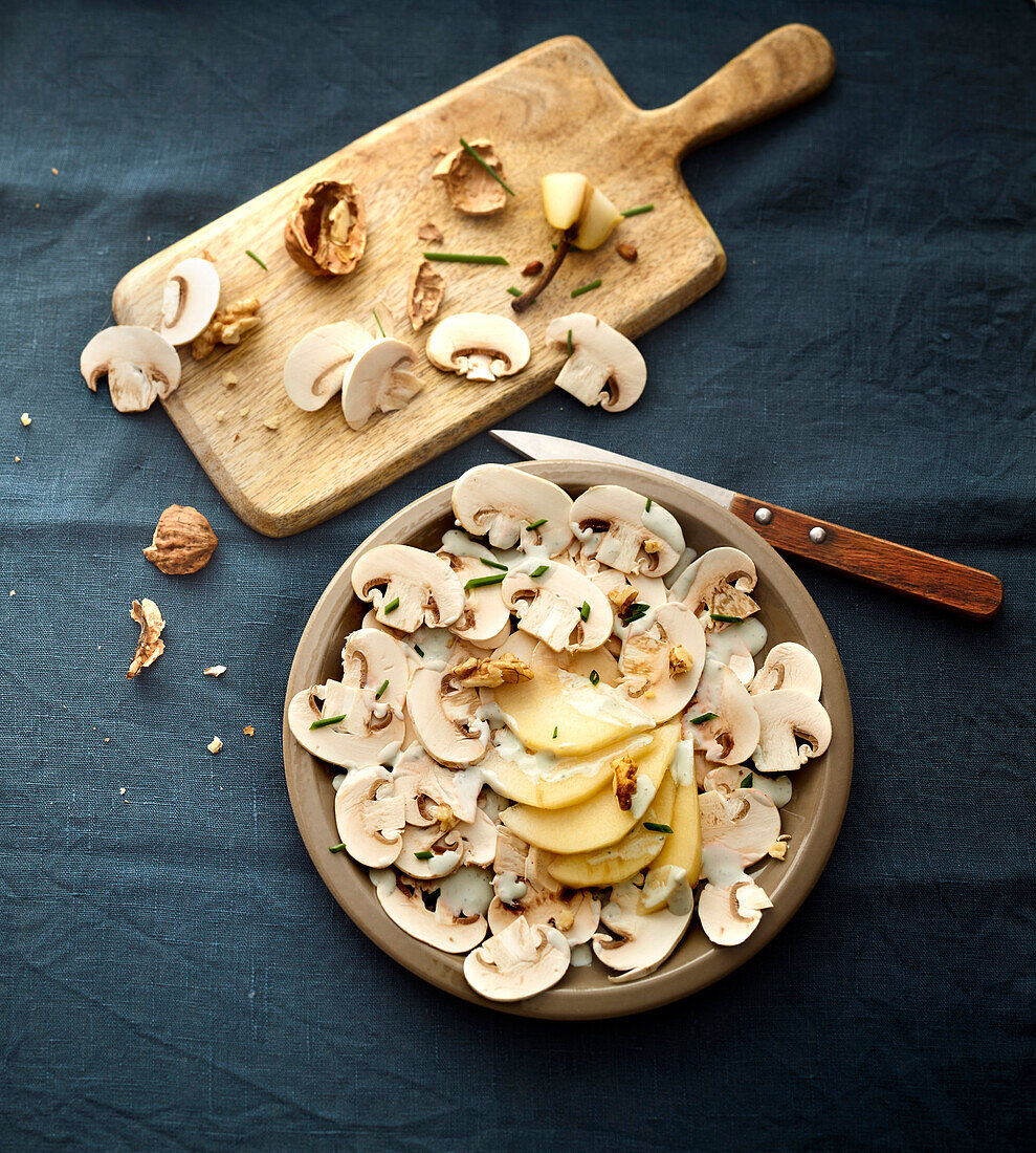 Mushroom carpaccio with pear and Roquefort cheese