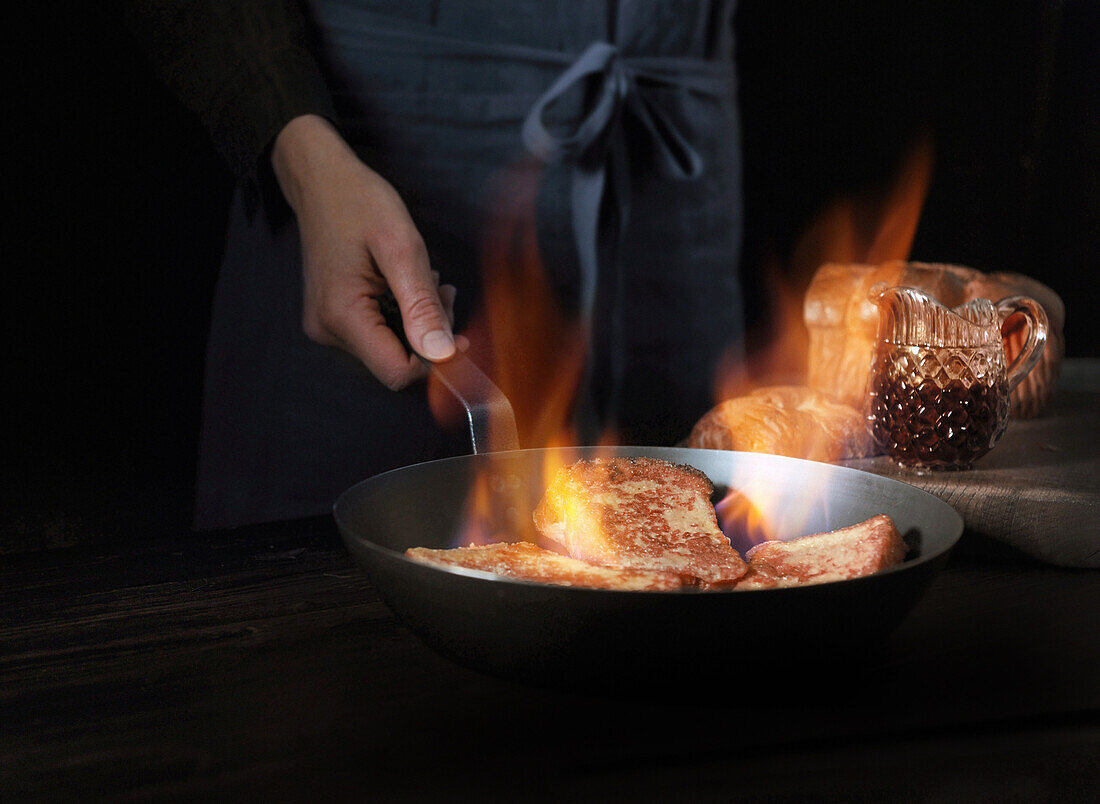 Flambé the brioche in the pan
