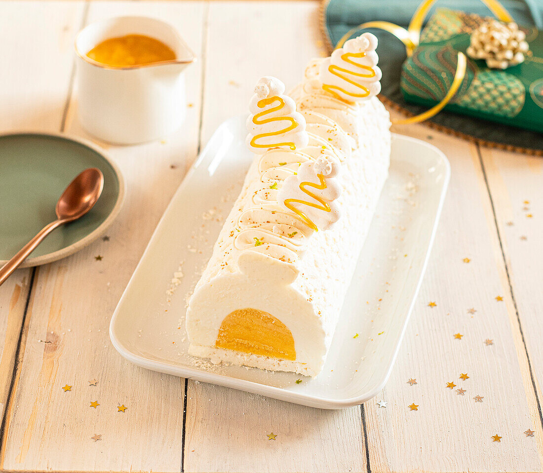 Vacherin-style coconut,mango and passionfruit ice cream Christmas log cake