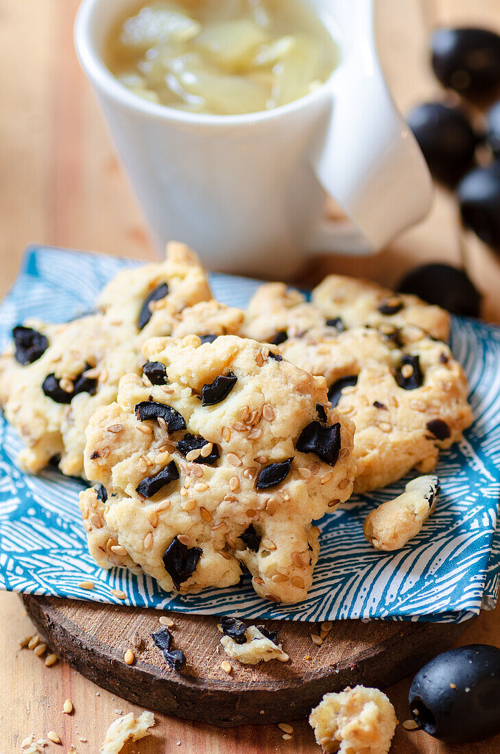 Salt cookies with black olives and sesame seeds