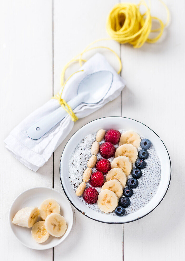 Porridge with banana, berries, and almonds