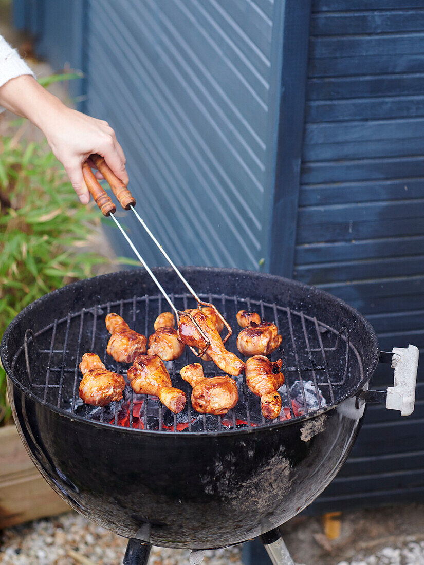 Chicken drumsticks on the grill