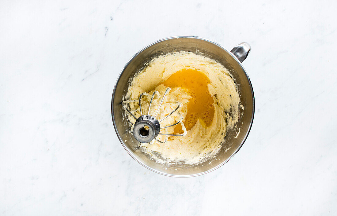 mixing the batter for a banana chocolate cake