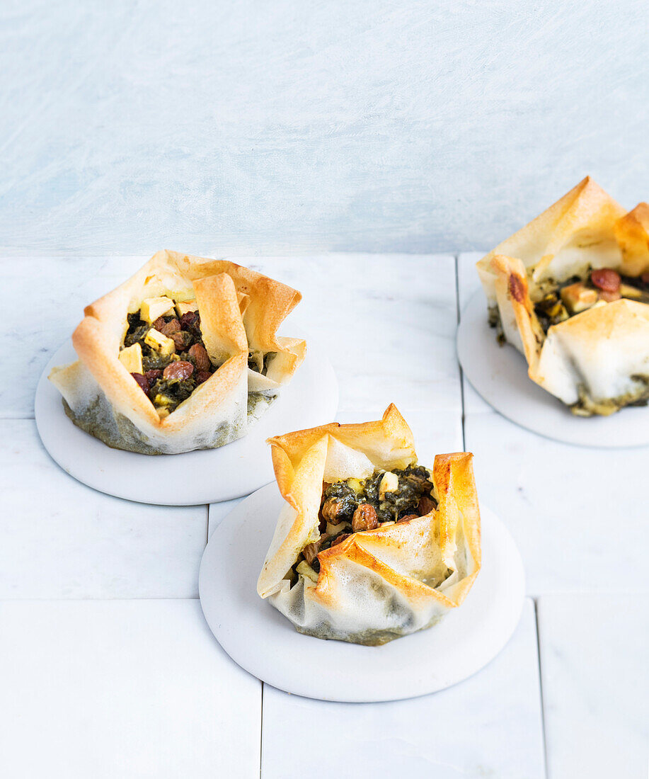 Crunchy tartelettes made from brick dough with chard filling