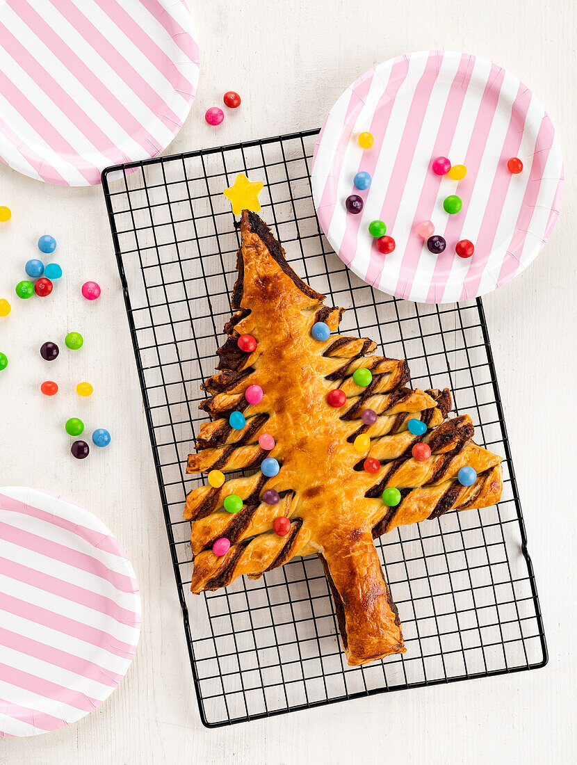 Puff pastry Christmas tree with chocolate and chocolate beans