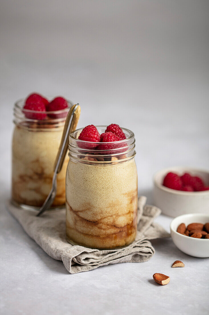 Semolina pudding with caramel sauce,almonds and raspberries