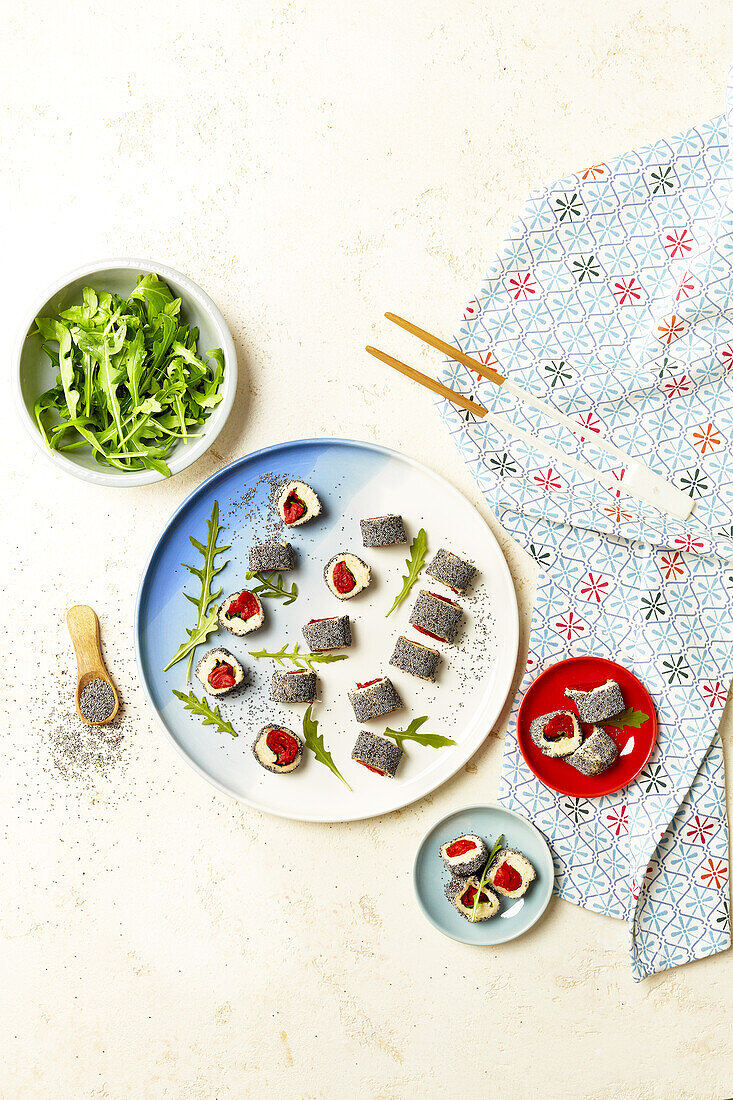 Fish maki with poppy seed peppers