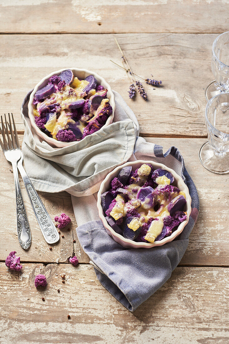 Gratin with vitelotte, purple cauliflower and Szechuan raclette cheese