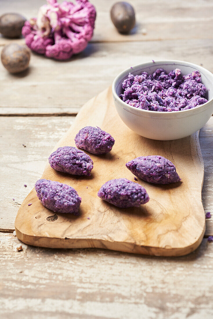 Making purple dumplings from Vitelotte potatoes and purple cauliflower