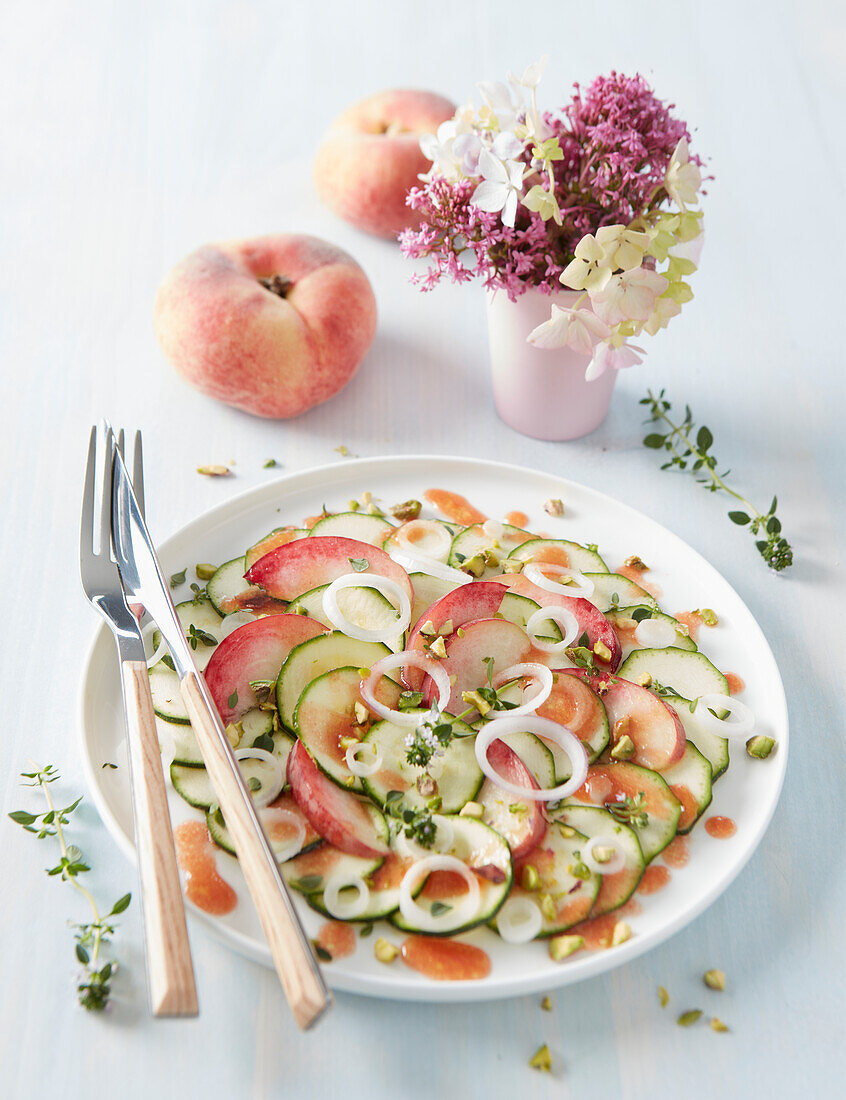 Carpaccio with cucumber, peaches and peach vinaigrette