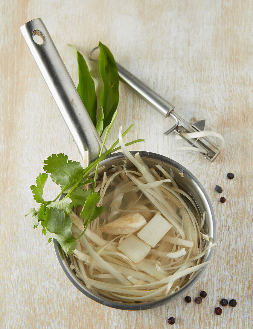 Prepare asparagus consommé from white asparagus shells