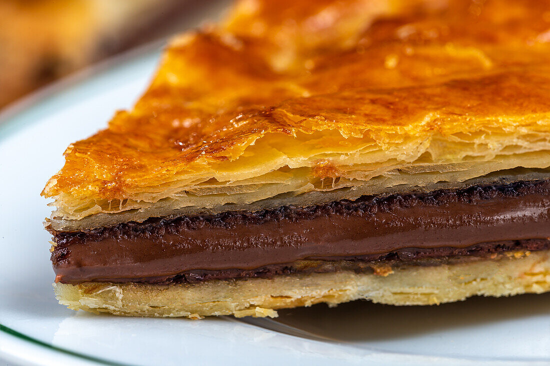 Galette des rois with chocolate (close-up of an Epiphany cakes)