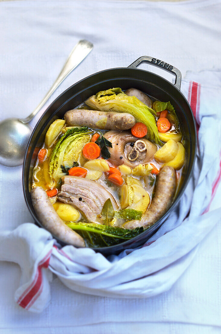 Hearty vegetable stew with meat and sausage
