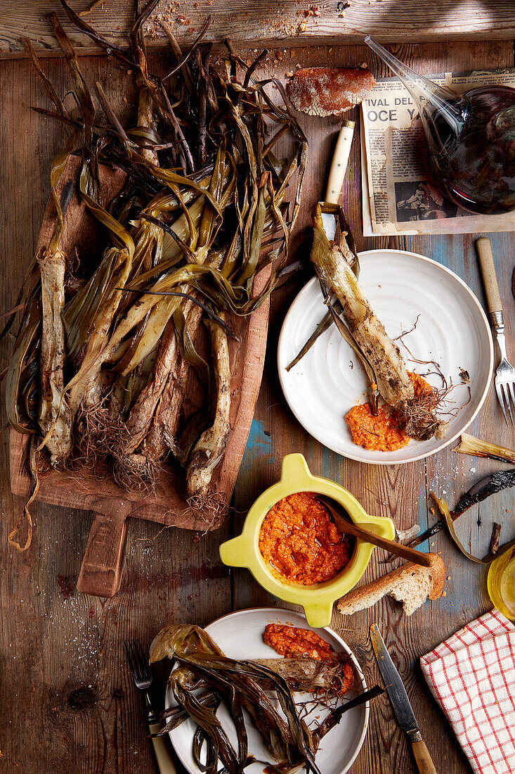Grilled calçots with romesco sauce (Spain)