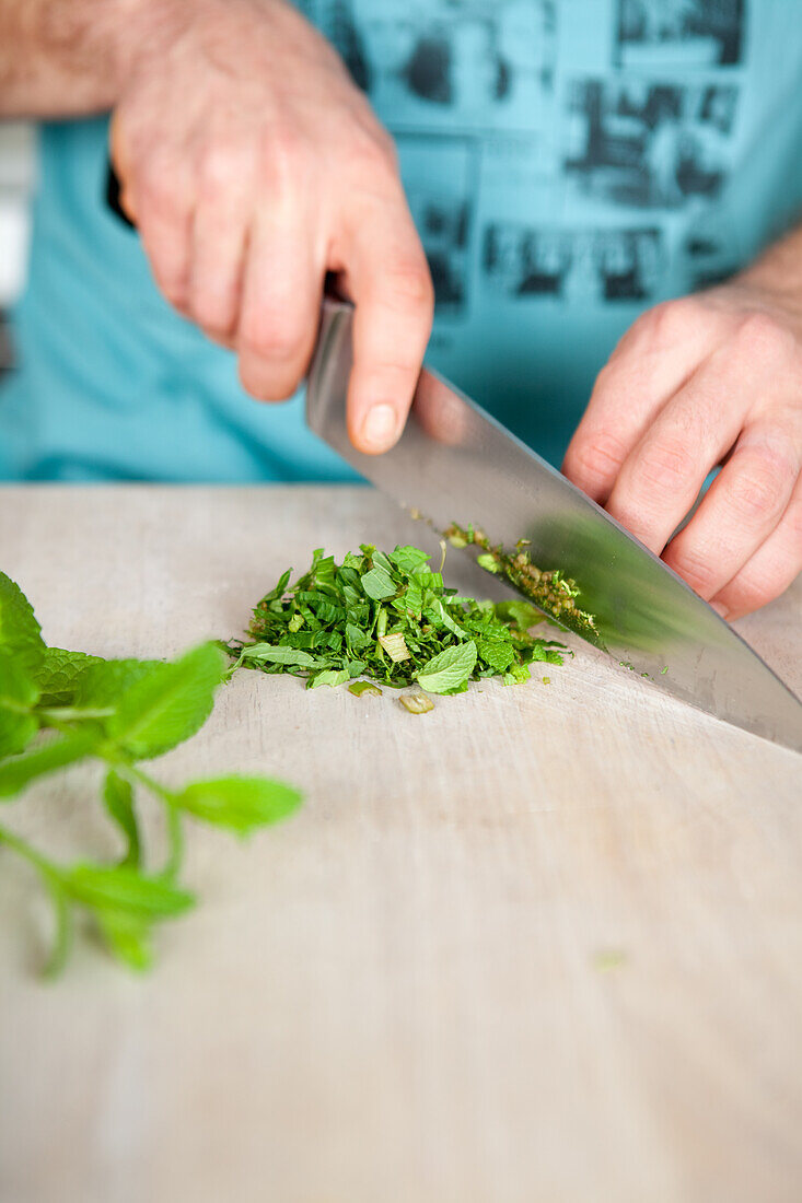 Preparation of a mint sauce - chop the mint