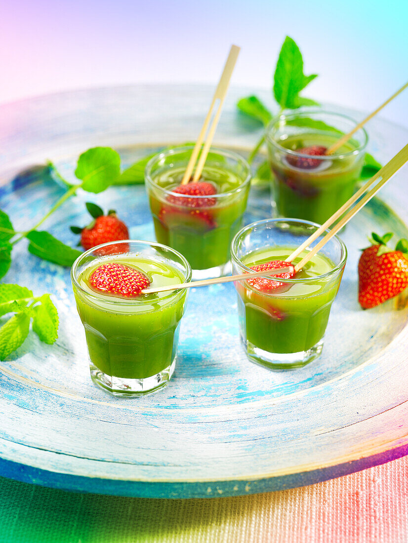 Mint sauce with strawberry skewers