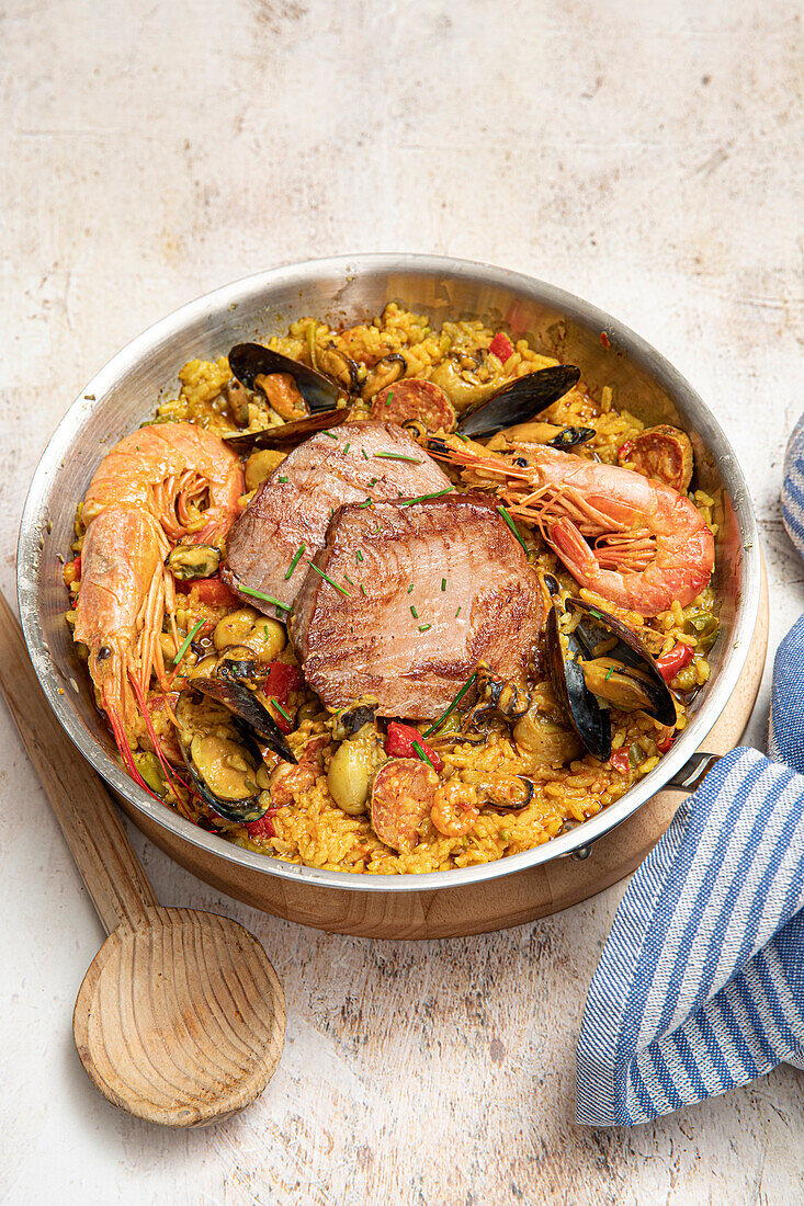 Seafood paella with tuna