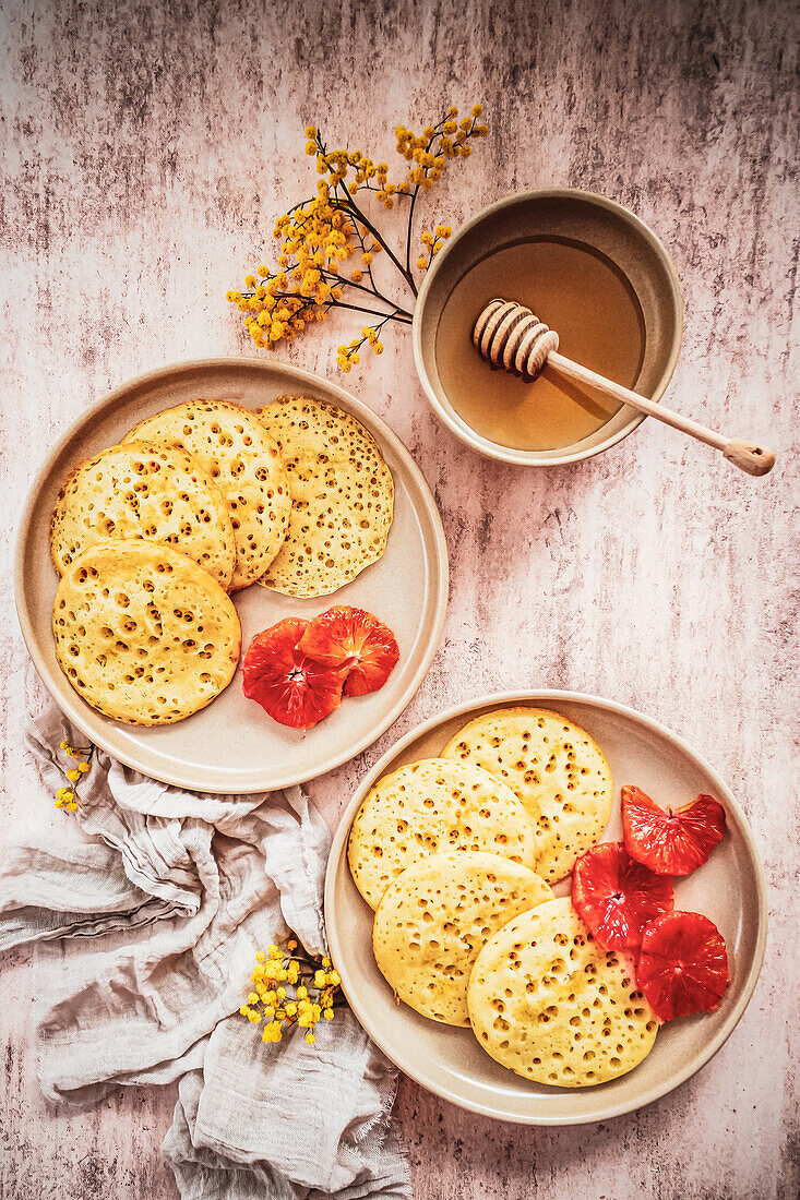 Baghrirs with blood oranges and honey