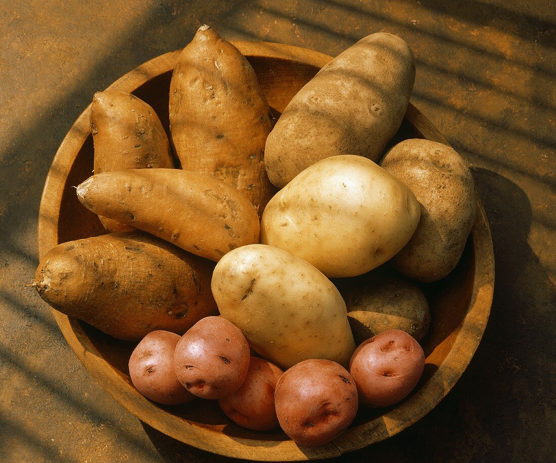 Assorted Potatoes in a Wooden Bowl