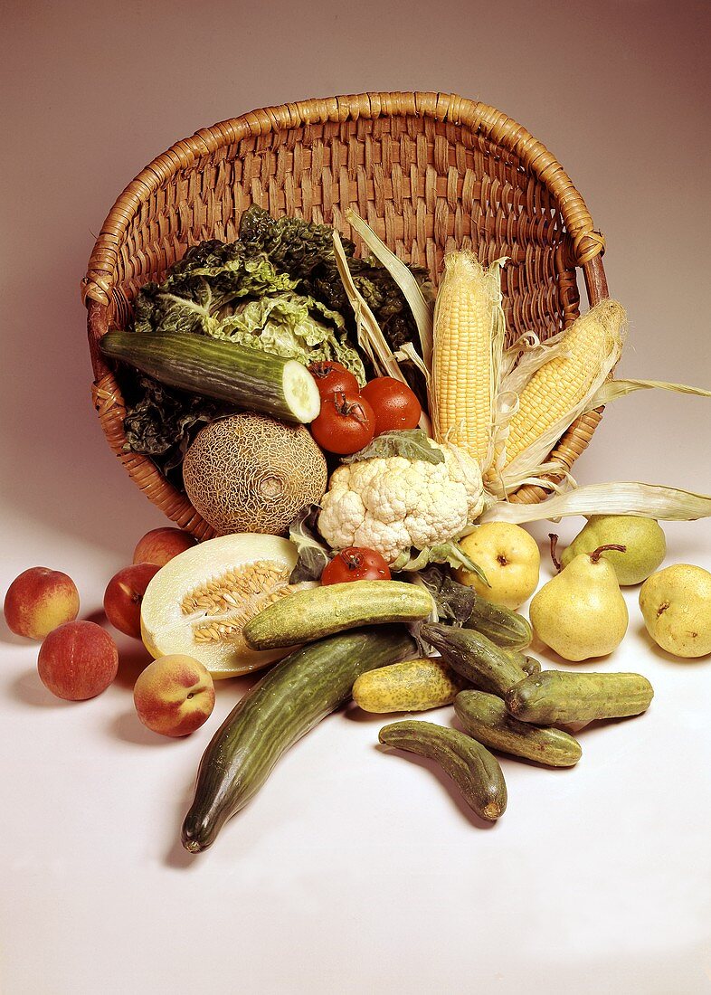 Fruit and Vegetables Spilling From a Basket