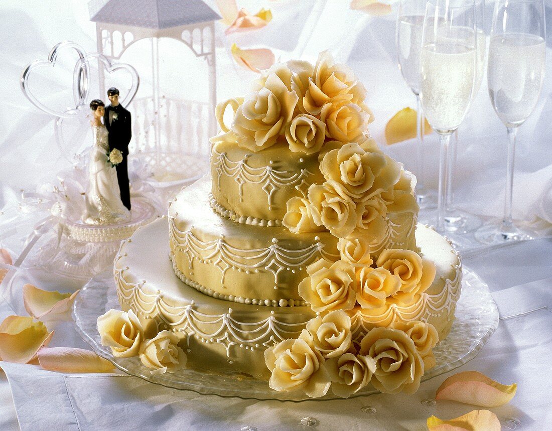 Three Tier Wedding Cake; Bride and Groom; Champagne