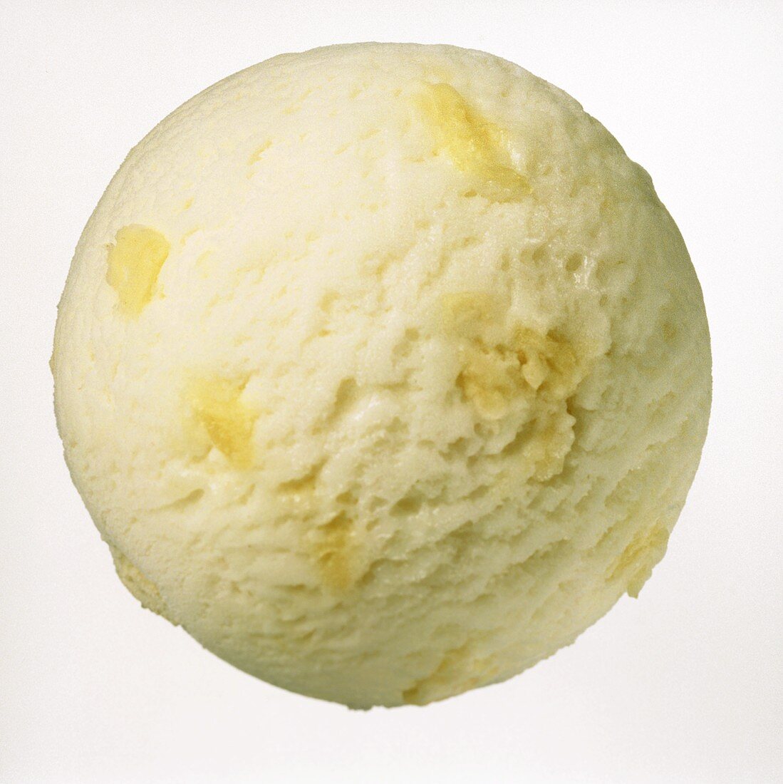 A scoop of pineapple ice cream