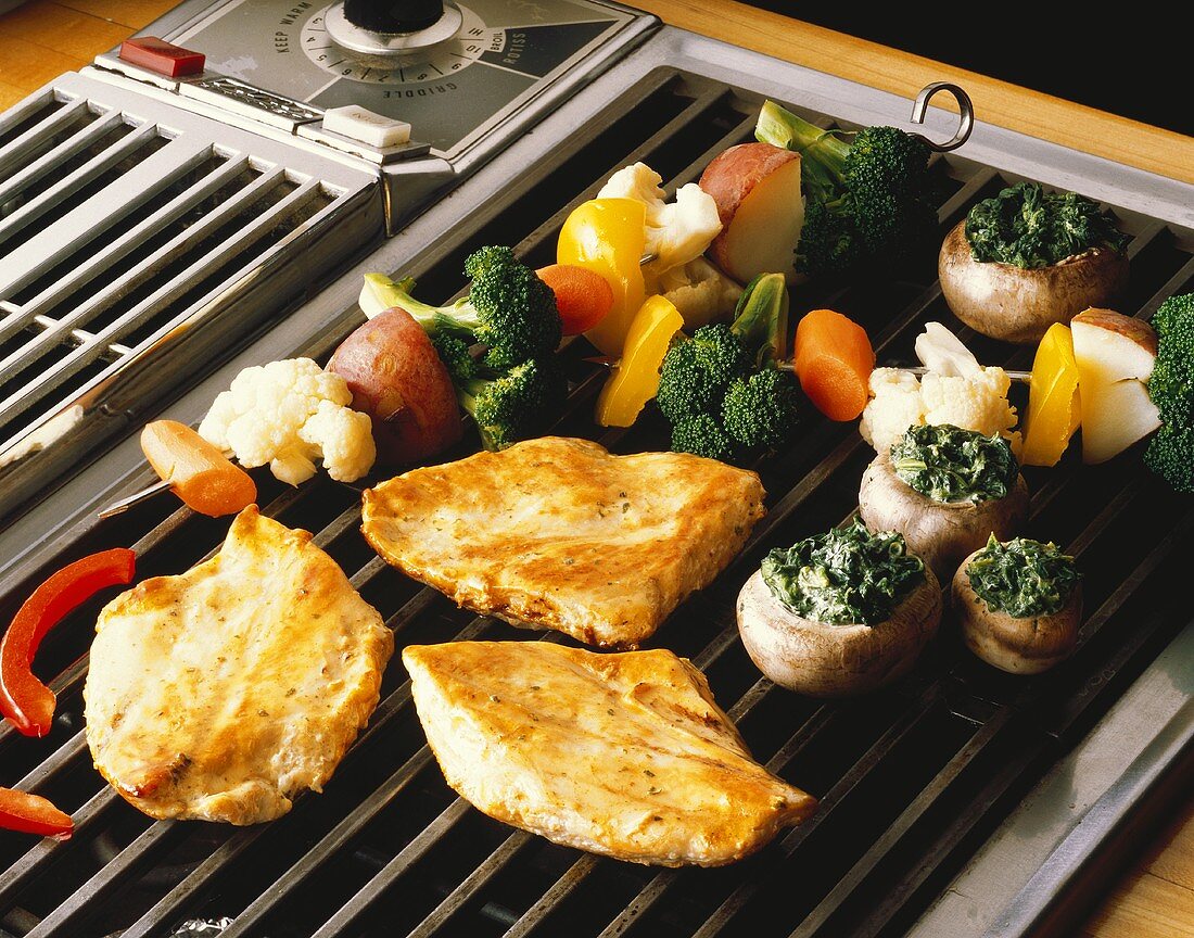 Chicken Breasts and Vegetables on Countertop Grill