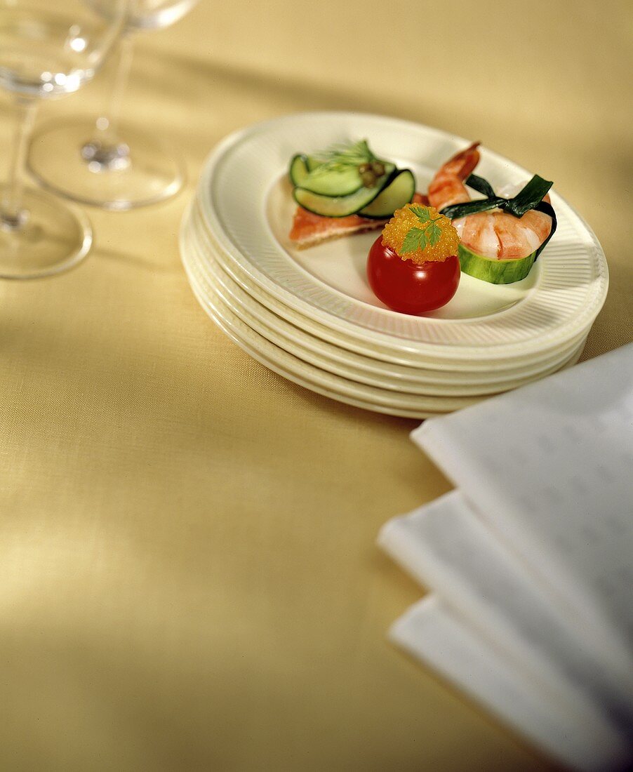 Assorted Hors d'Oeuvres on a Stack of Plates