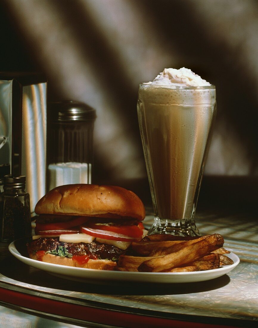 Cheeseburger with Fries and a Chocolate Milkshake