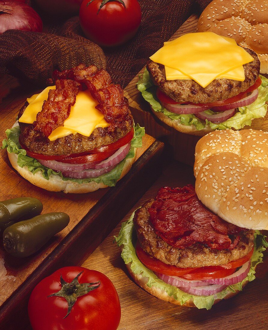 A Cheeseburger, a Bacon Cheeseburger and a Pastrami Burger"