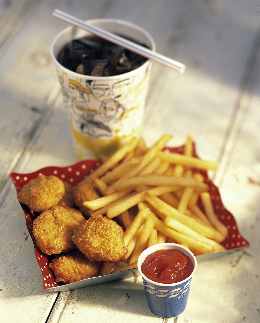 Chicken Nuggets with Fries and a Cola