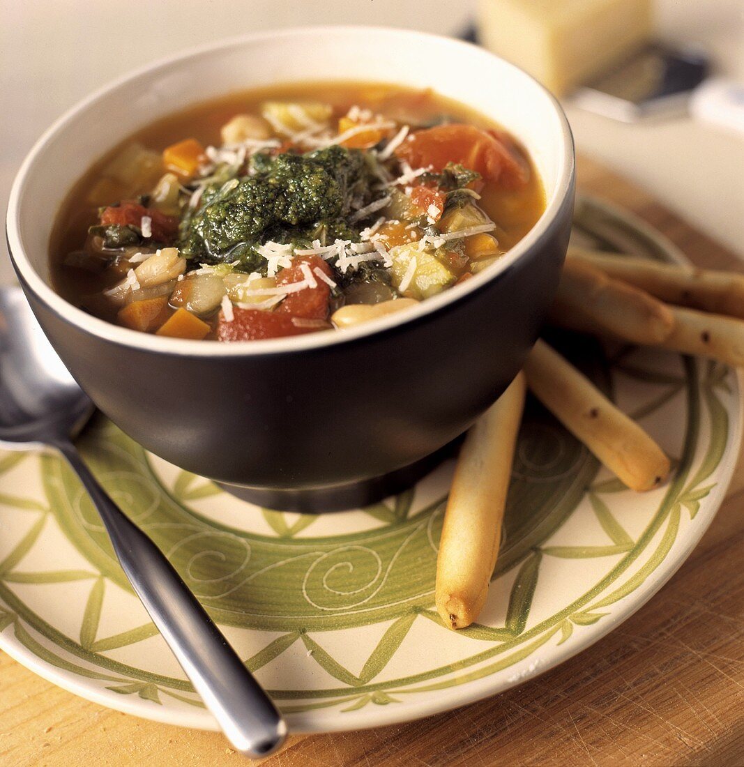 Minestrone al pesto (Vegetable soup with pesto & grissini)