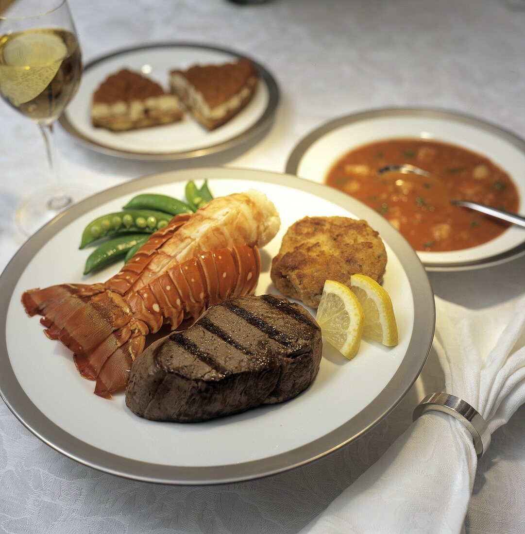 Surf and Turf: Lobster Tail with Steak and a Crab Cake
