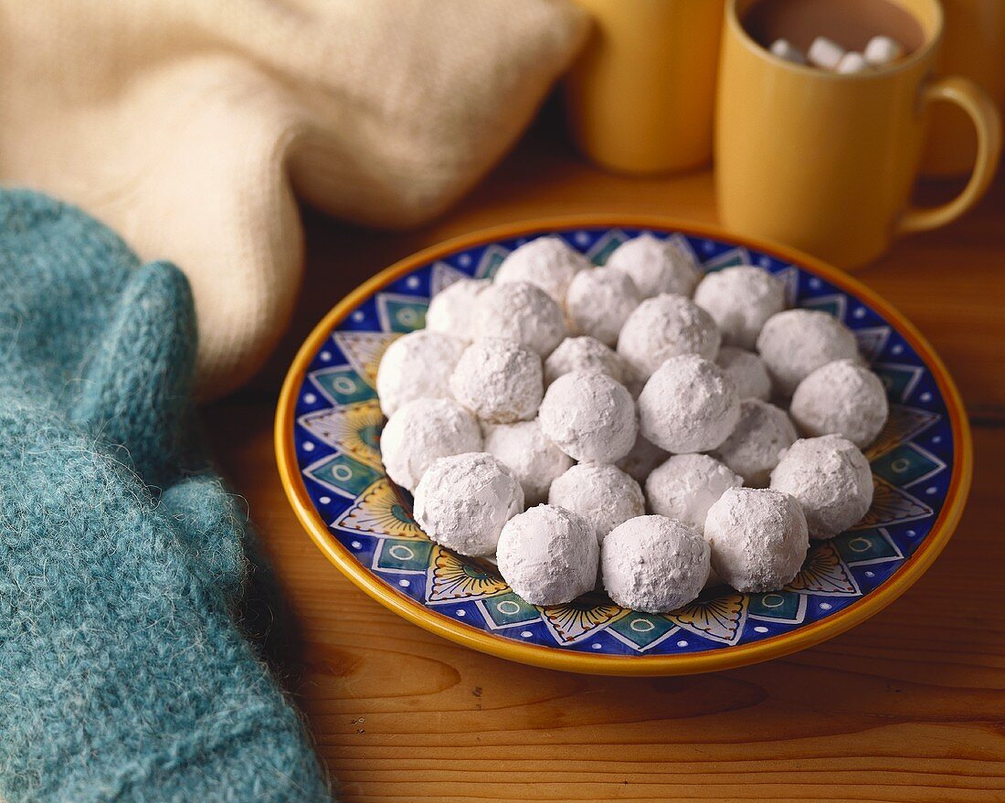 Snowball Cookies with Icing Sugar; Hot Chocolate