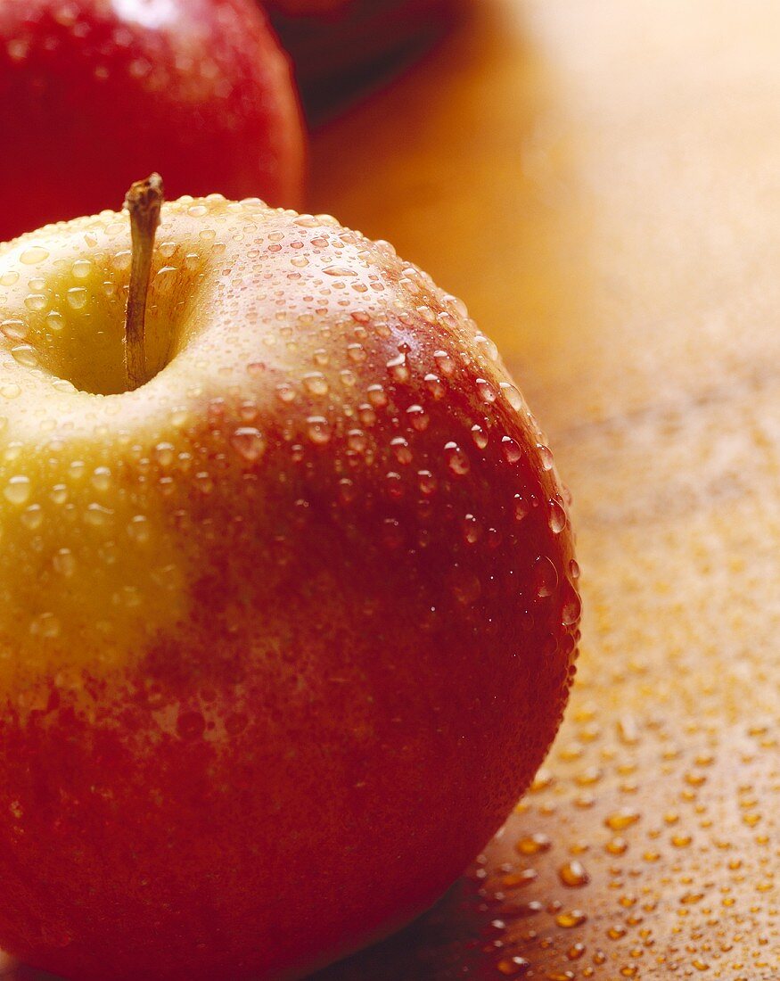 An Empire Apple with Water Droplets
