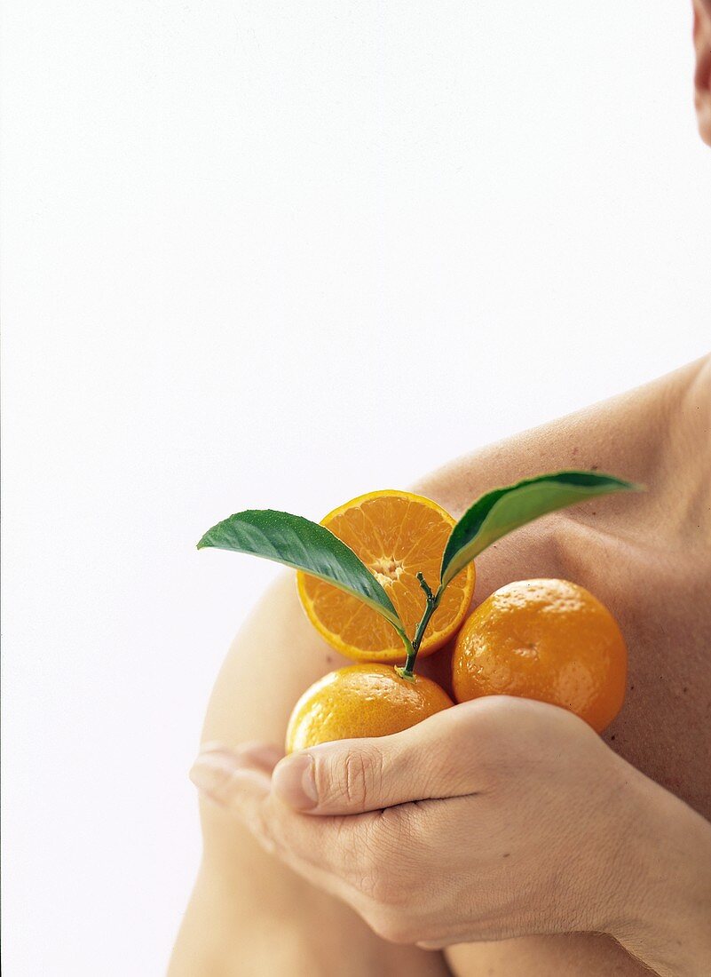 Tangerines on a Man's Shoulder