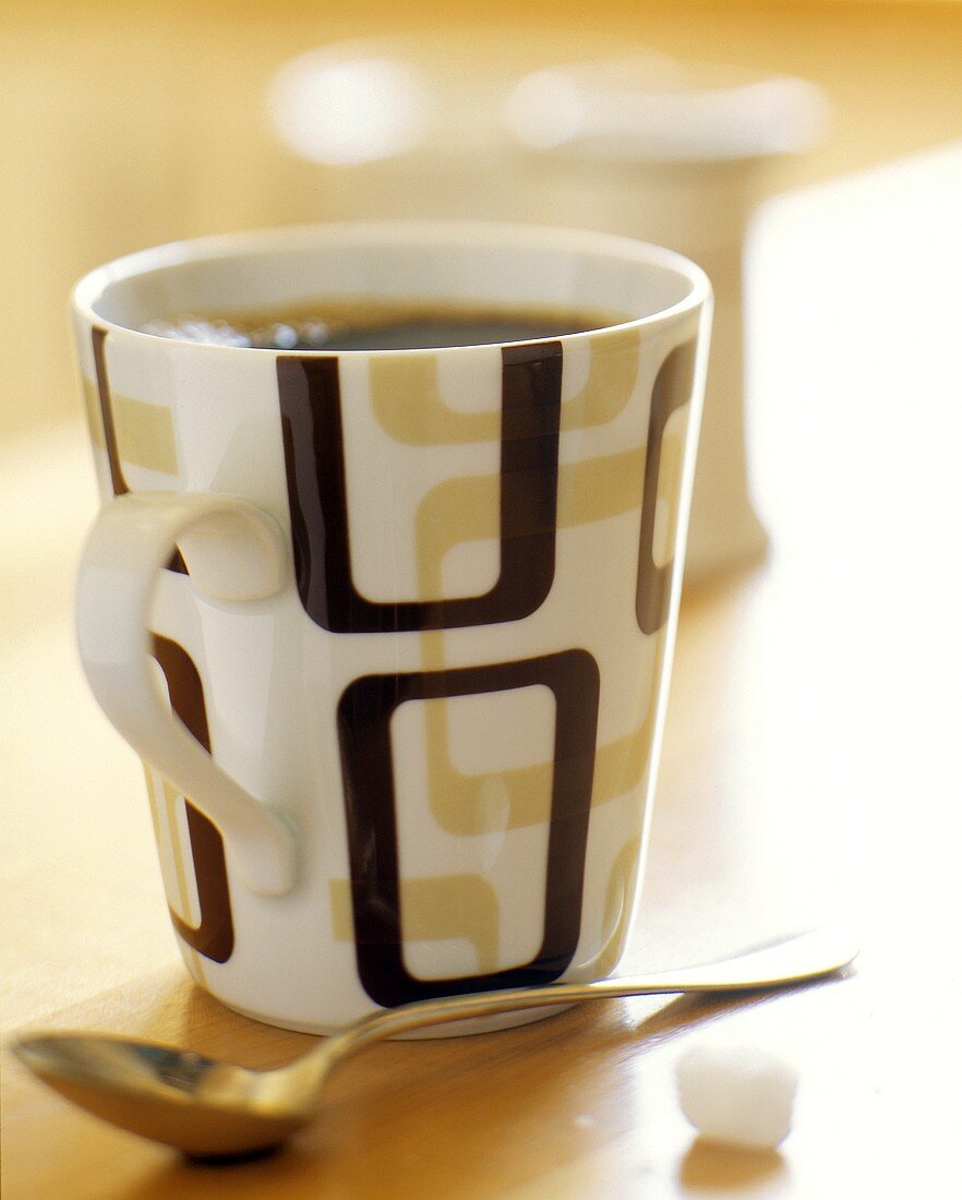 Black Coffee in a White & Brown Mug