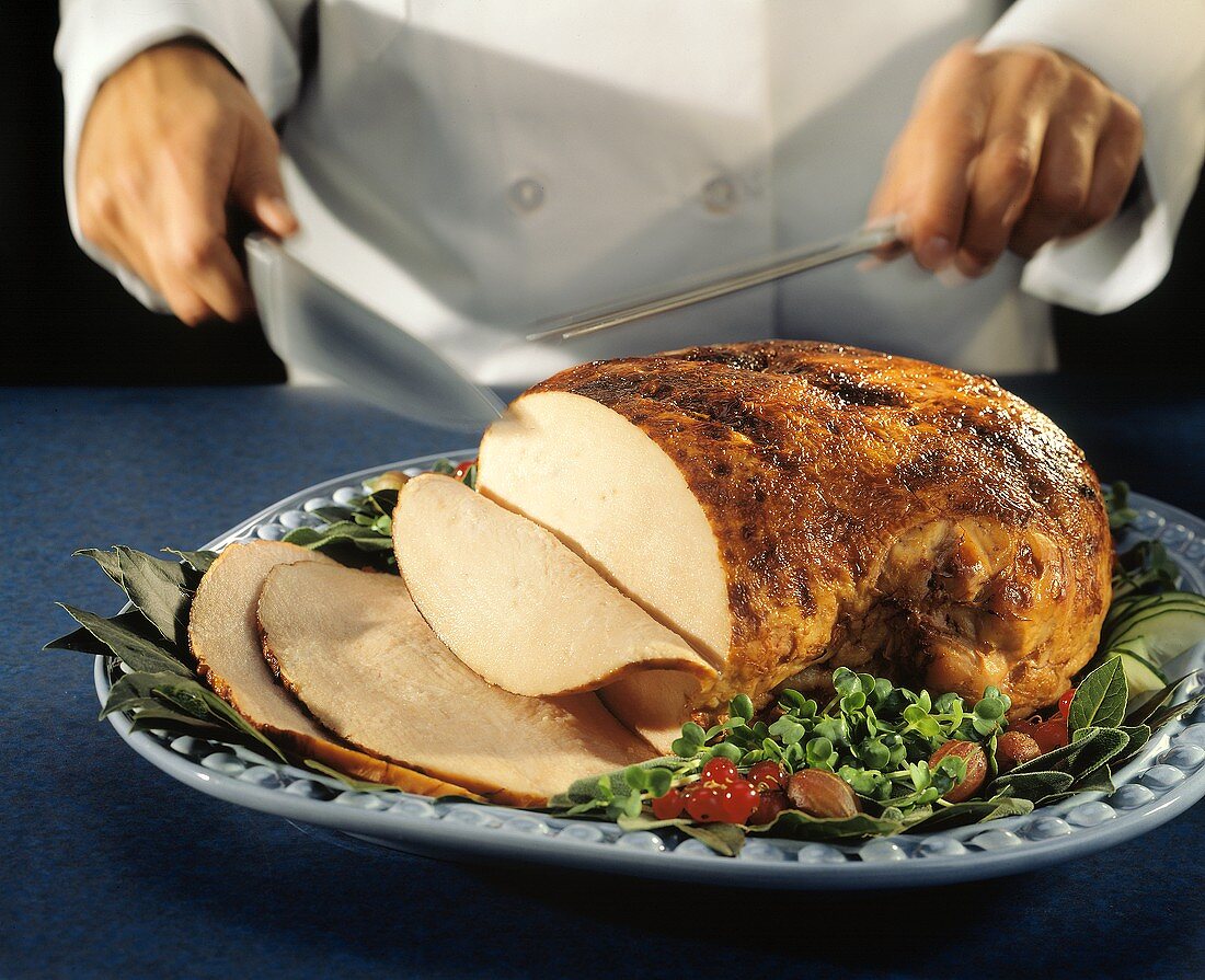 Chef Cutting Turkey Breast