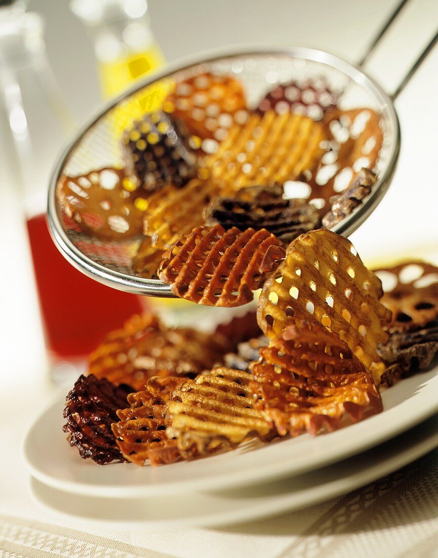 Fried Vegetables on Wire Ladle and on Plate