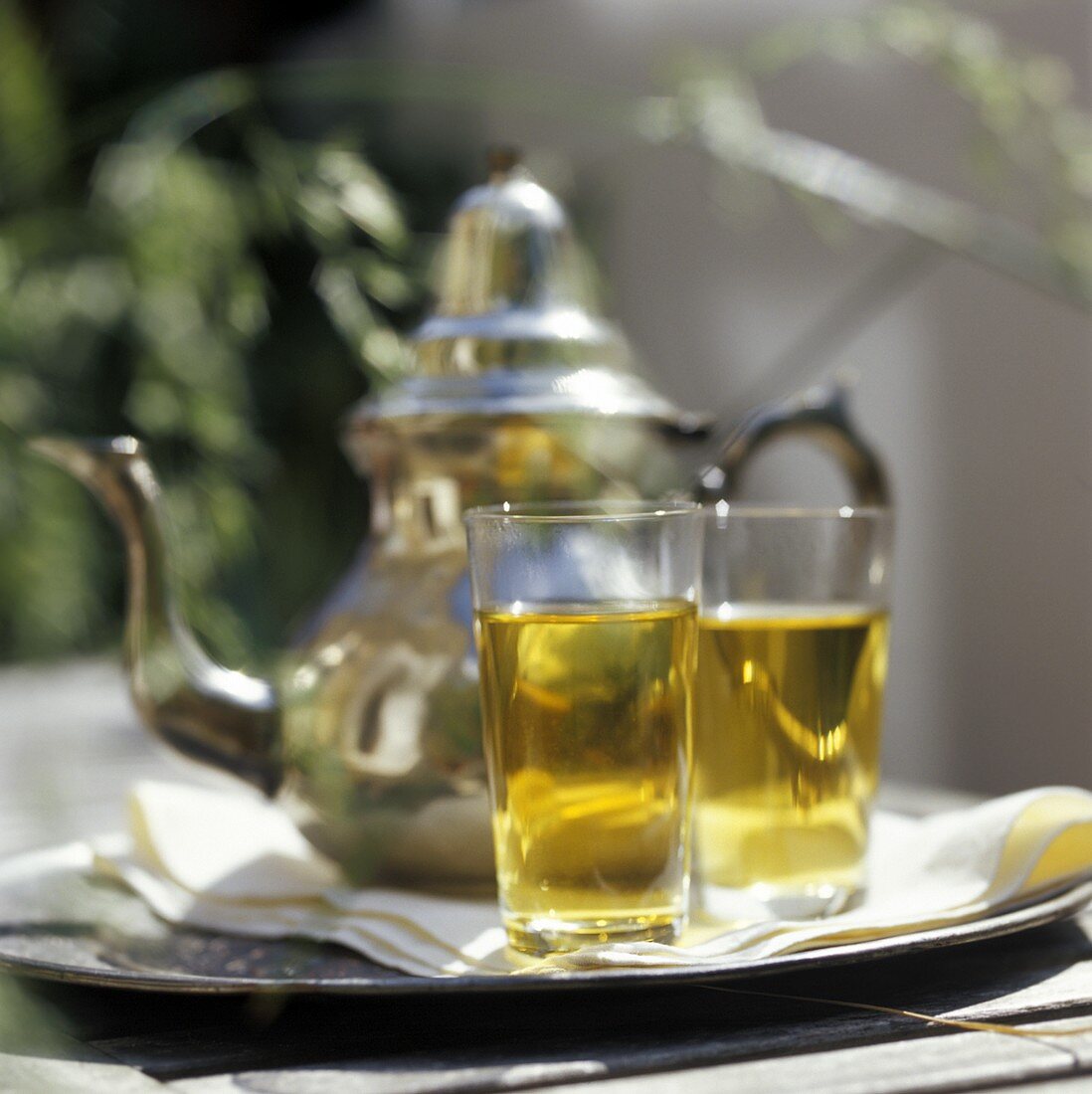 A Pot and Two Glasses of Mint Tea