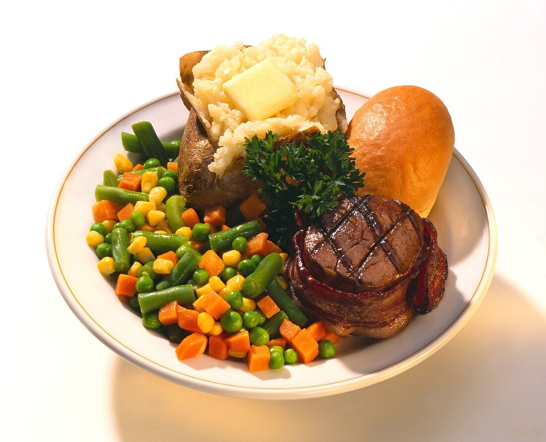 Bacon Wrapped Beef Fillet with Baked Potato and Vegetables
